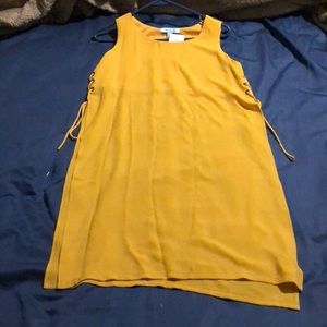 She and Sky all tied up tunic in golden yellow